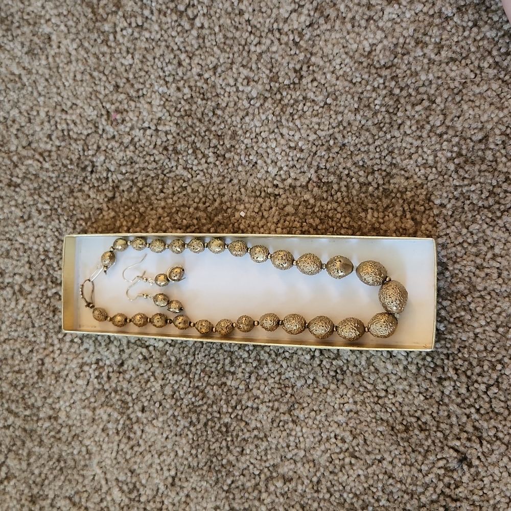 Hand repaired gold bead necklace
